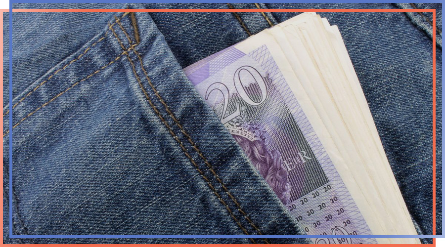 Roll of banknotes in pocket saved fraudulently